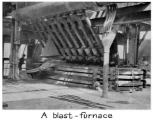 Historic photograph of a lead blast furnace at the Bunker Hill smelter in Idaho's Silver Valley.