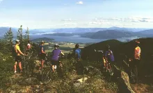 Mountain bikers above Lake Pend Oreille on Schweitzer Mountain at the end of summer season.