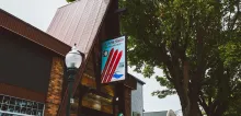 The Alpine Shop exterior in Sandpoint with its Alpine Shop Ski Board Boat sign reading Since 1966.