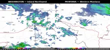 Regional weather radar for Tuesday, October 27, 2026 showing showers over Bonners Ferry, Sandpoint and Coeur d'Alene and along the I-90 and US-95 corridors in North Idaho, with showers in western Montana.