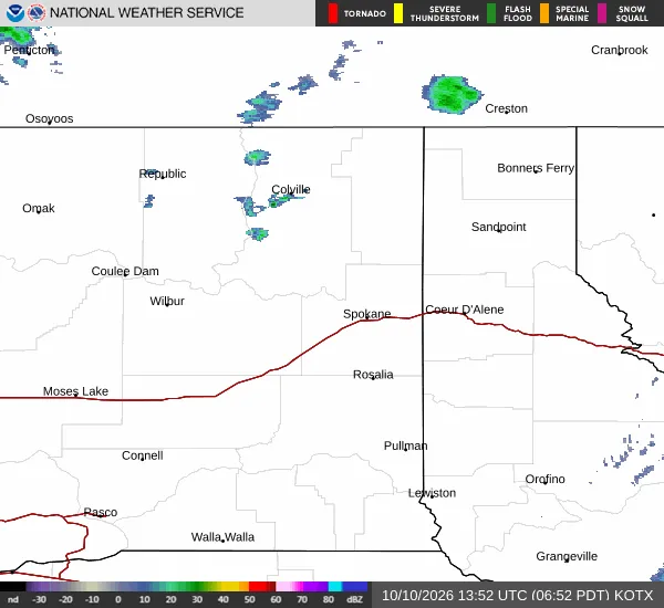 KOTX NEXRAD radar on the morning of October 10, 2026, showing shower activity with echo cells over the Colville highlands and near the Canadian border north of Sandpoint.